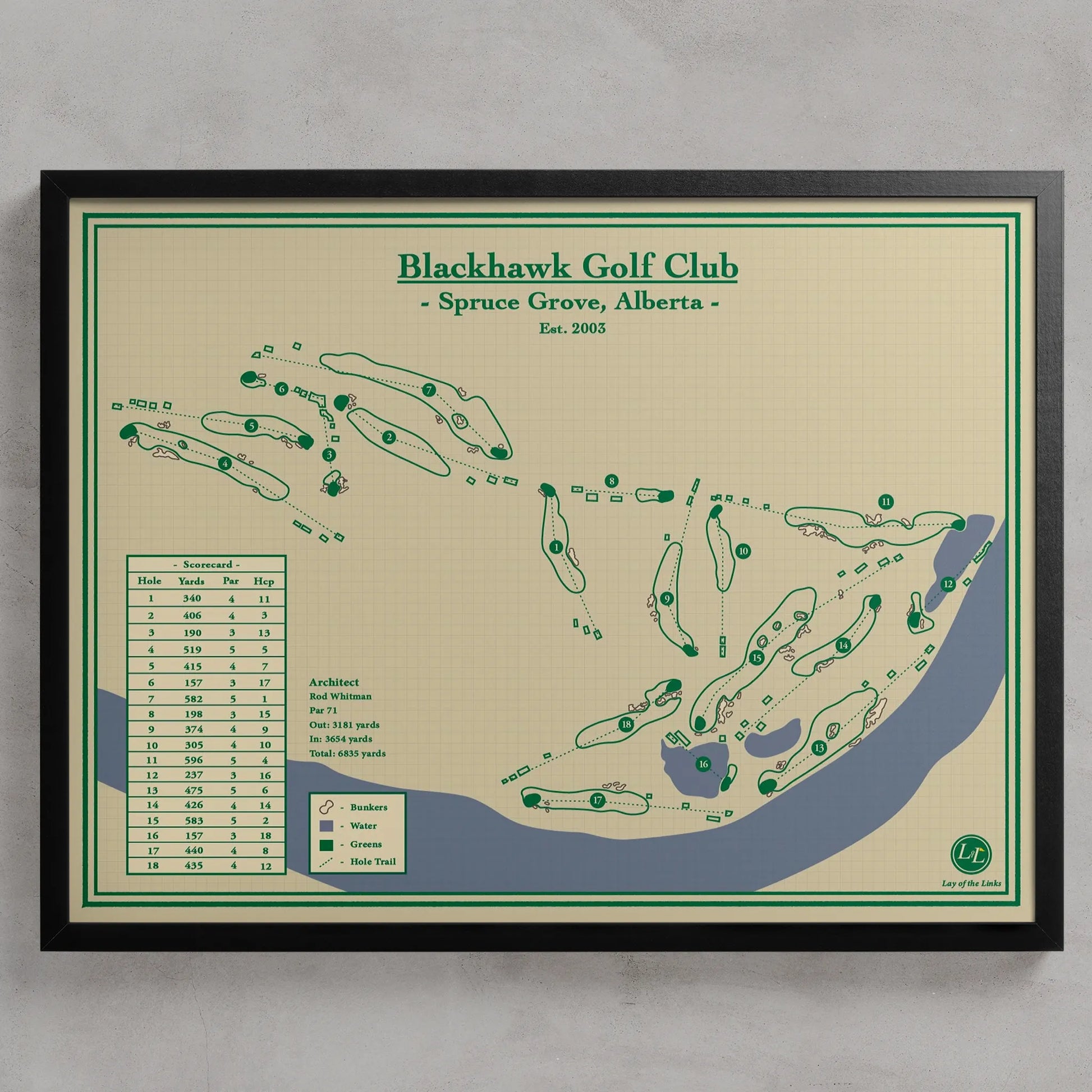A framed vintage-style golf course map for Blackhawk Golf Club, Spruce Grove, Alberta, featuring green tee and bunker shapes, a course index, and a black frame against a light gray wall.
