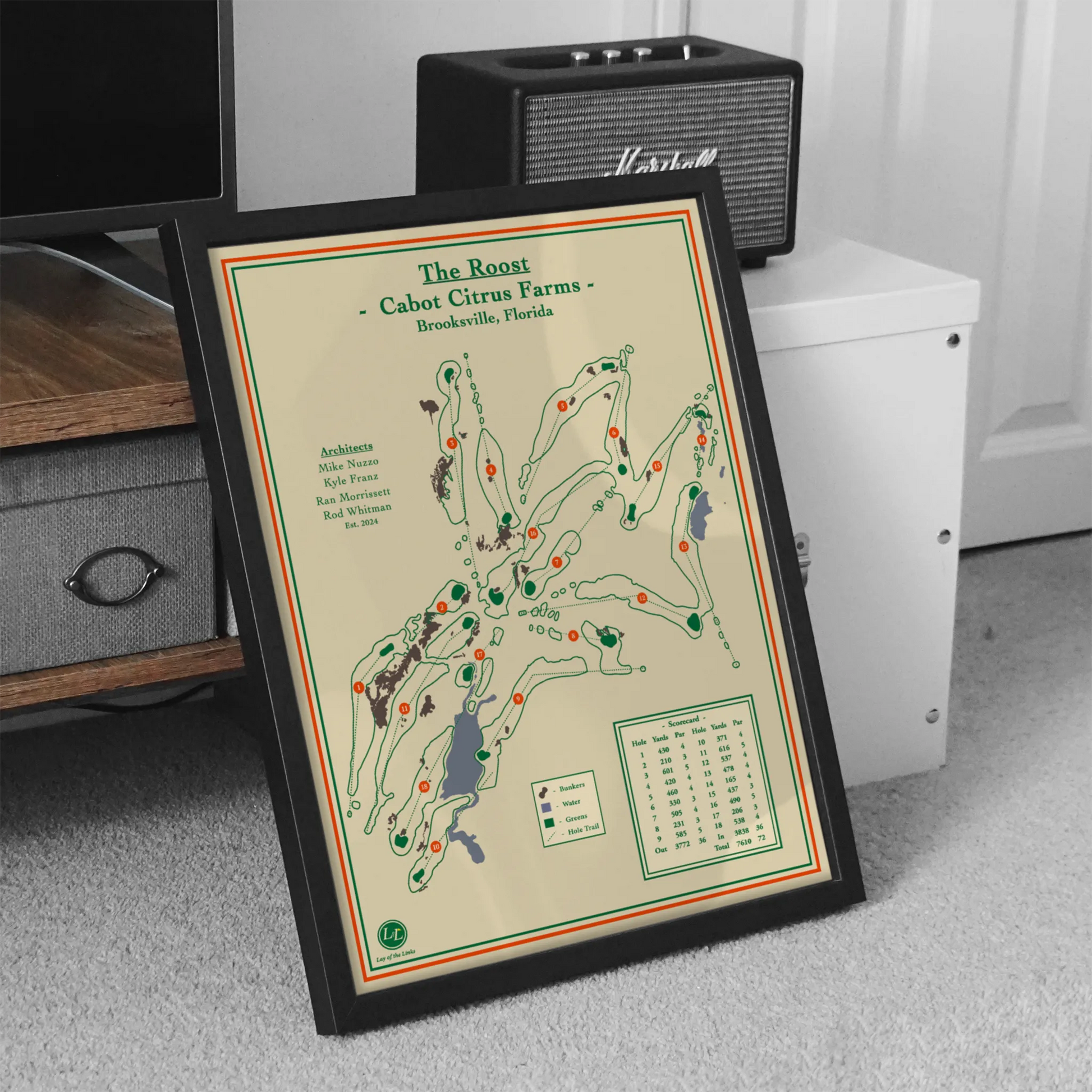 Framed map of Cabot Citrus Farms on a carpeted floor with a Marshall amplifier in the background.