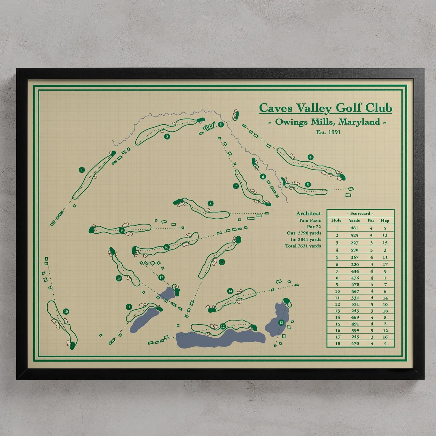 A framed vintage-style golf course map for Caves Valley Golf Club, Owings Mills, Maryland, featuring green course layouts and text on a cream background with a black frame, shown against a light gray wall.