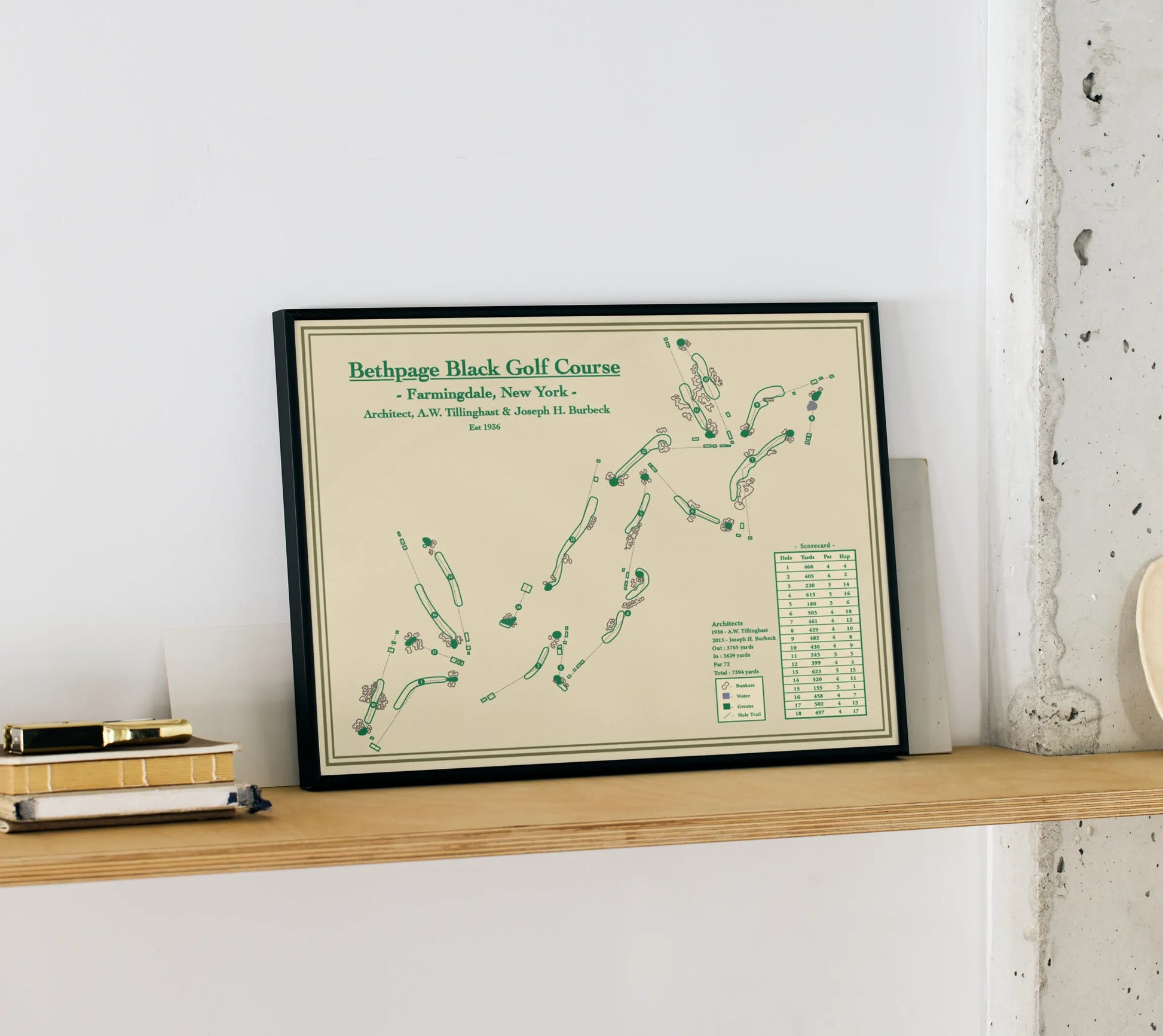 Framed map of Bethpage Black Golf Course on a wooden shelf.