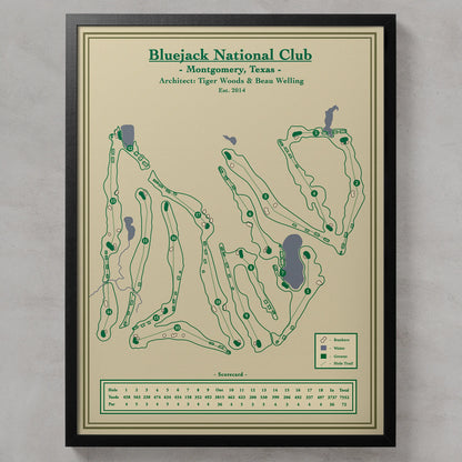 Bluejack National course map in a black wood frame showing the Tiger Woods design winding through towering Texas pines.