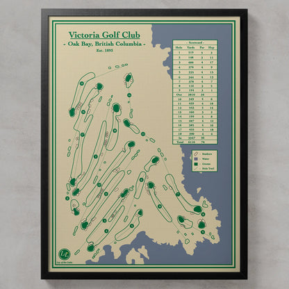 A framed vintage-style Victoria Golf Club map print with course holes illustrated in green on a cream and blue background, shown against a light gray wall.