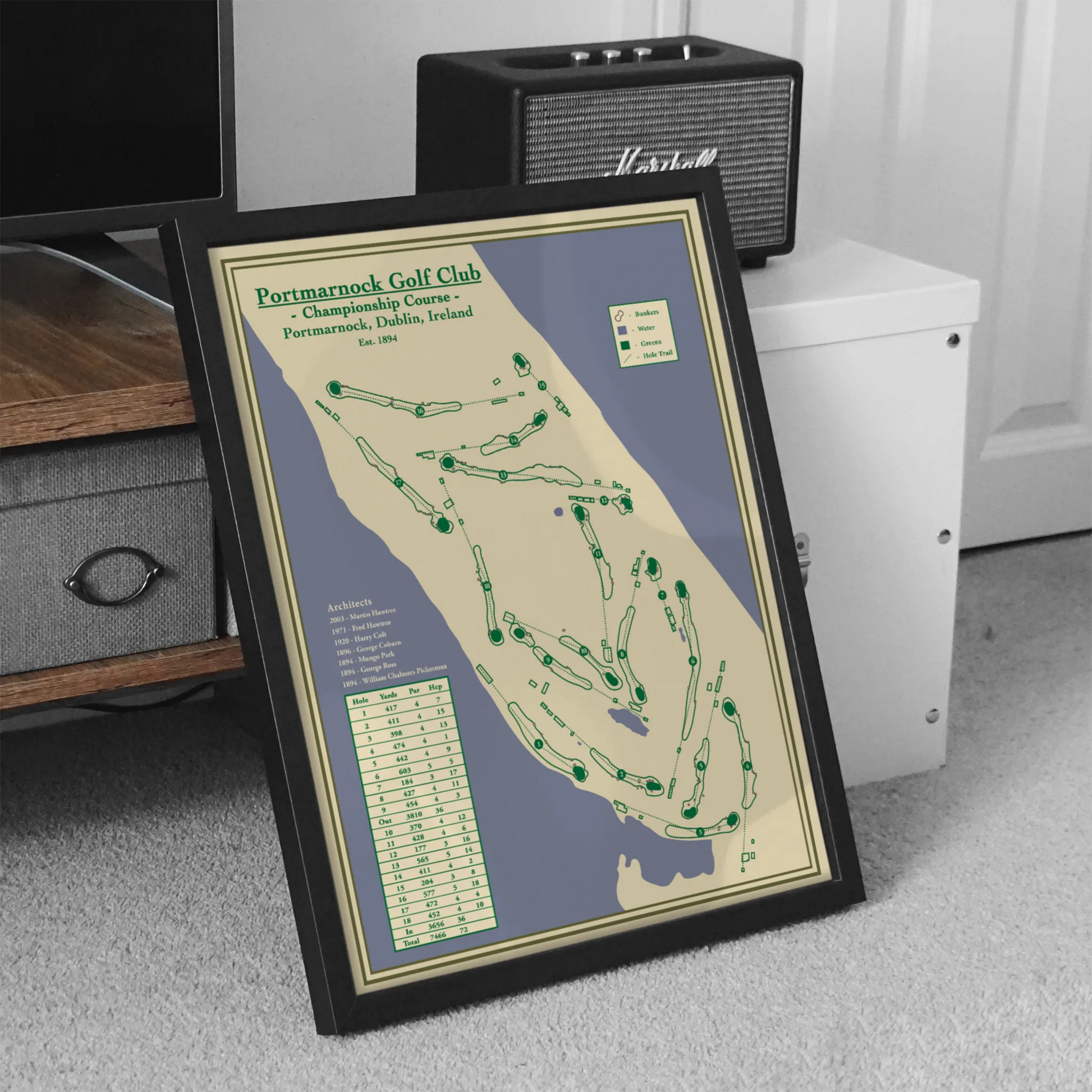 Framed Course Map of Portmarnock Golf Club on a desk with a Marshall speaker in the background.