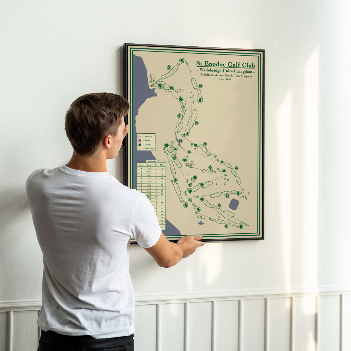framed map of St. Enodoc Golf Club on a white wall.