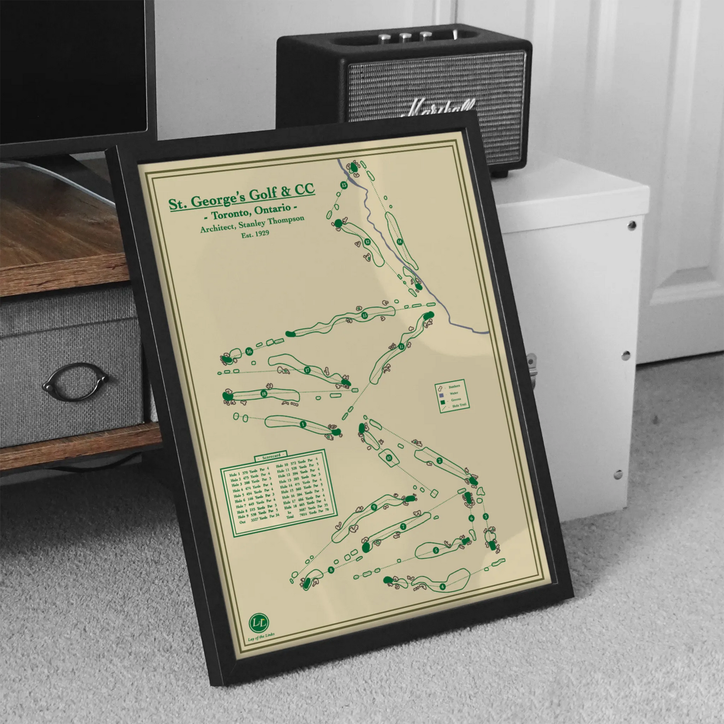 golf course map of st george's golf club on a desk with a Marshall speaker in the background