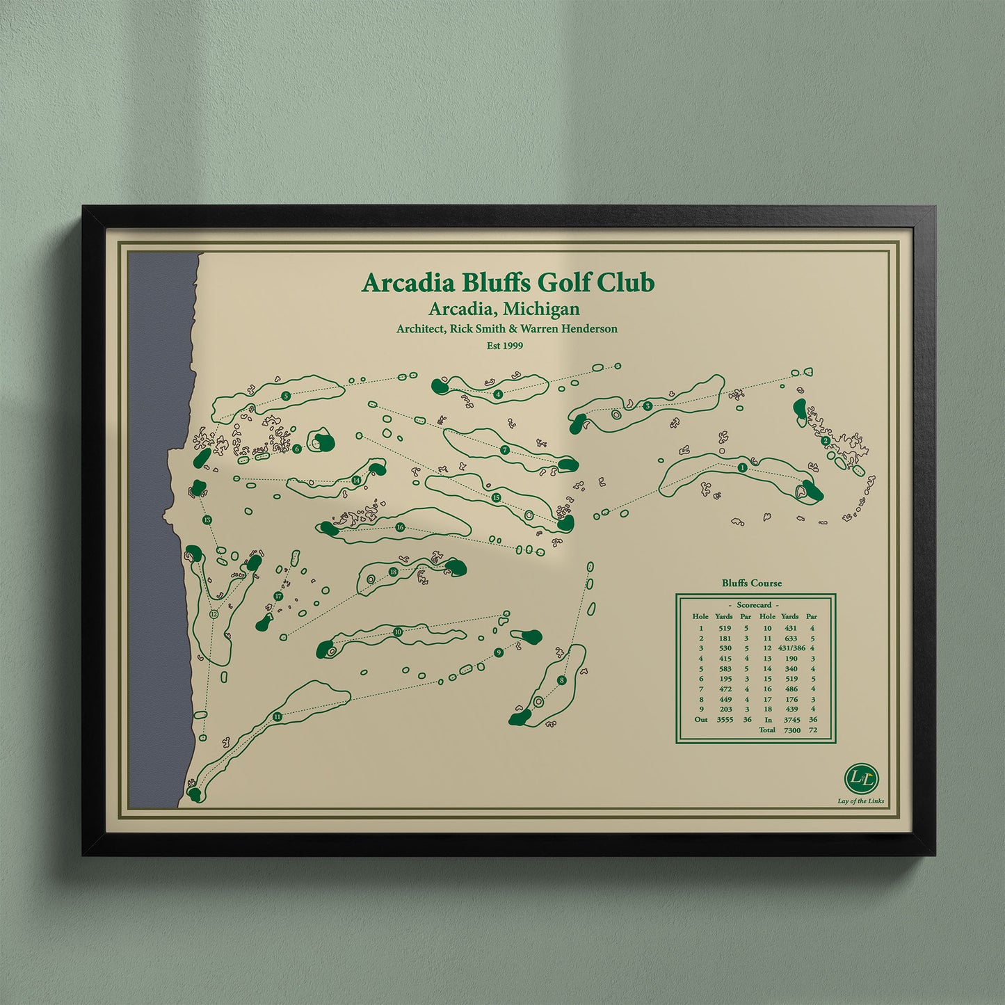 Framed Arcadia Bluffs map in a black wood frame showing the dramatic dunes and sod-walled bunkers.