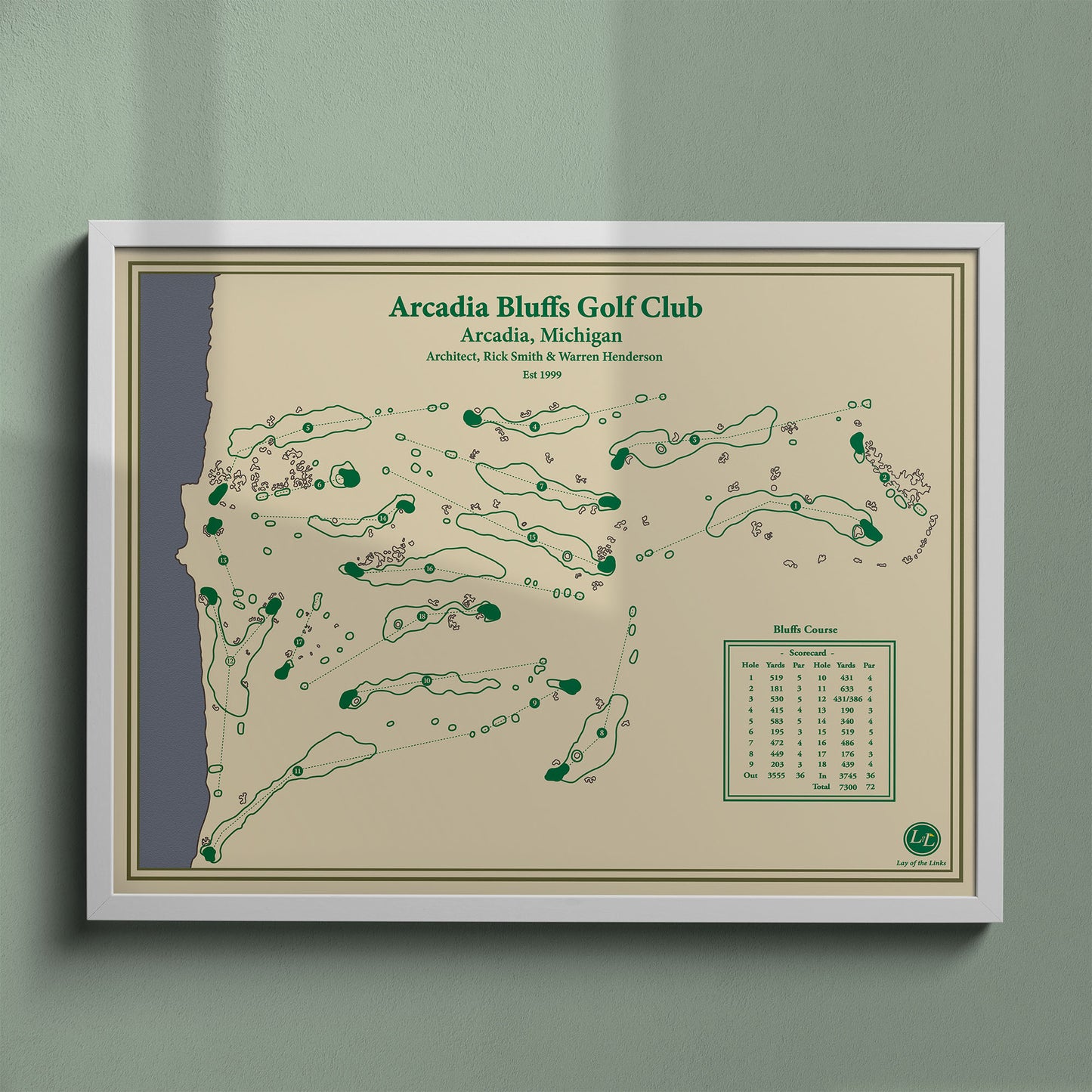 Arcadia Bluffs golf course map print in a white frame, featuring the windswept links layout on Lake Michigan.