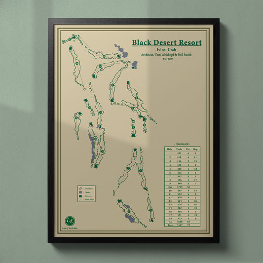 Framed Black Desert Resort Golf Course map in a black wood frame showing the Tom Weiskopf design amidst black lava.
