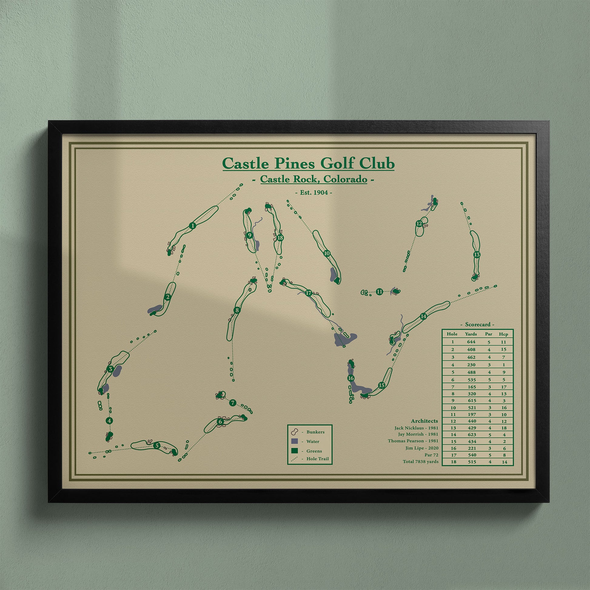 Castle Pines Golf Club Map in a black wood frame showing the mountain routing and elevation changes.