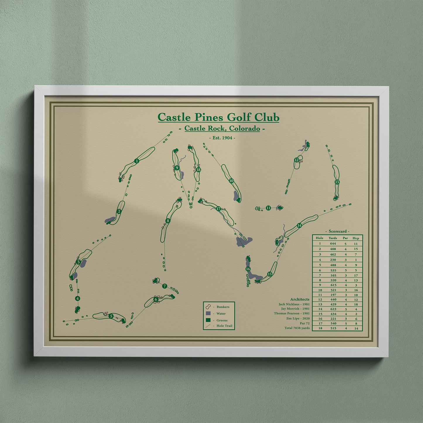 Castle Pines map print in a white frame, featuring the Jack Nicklaus signature course in Castle Rock, Colorado