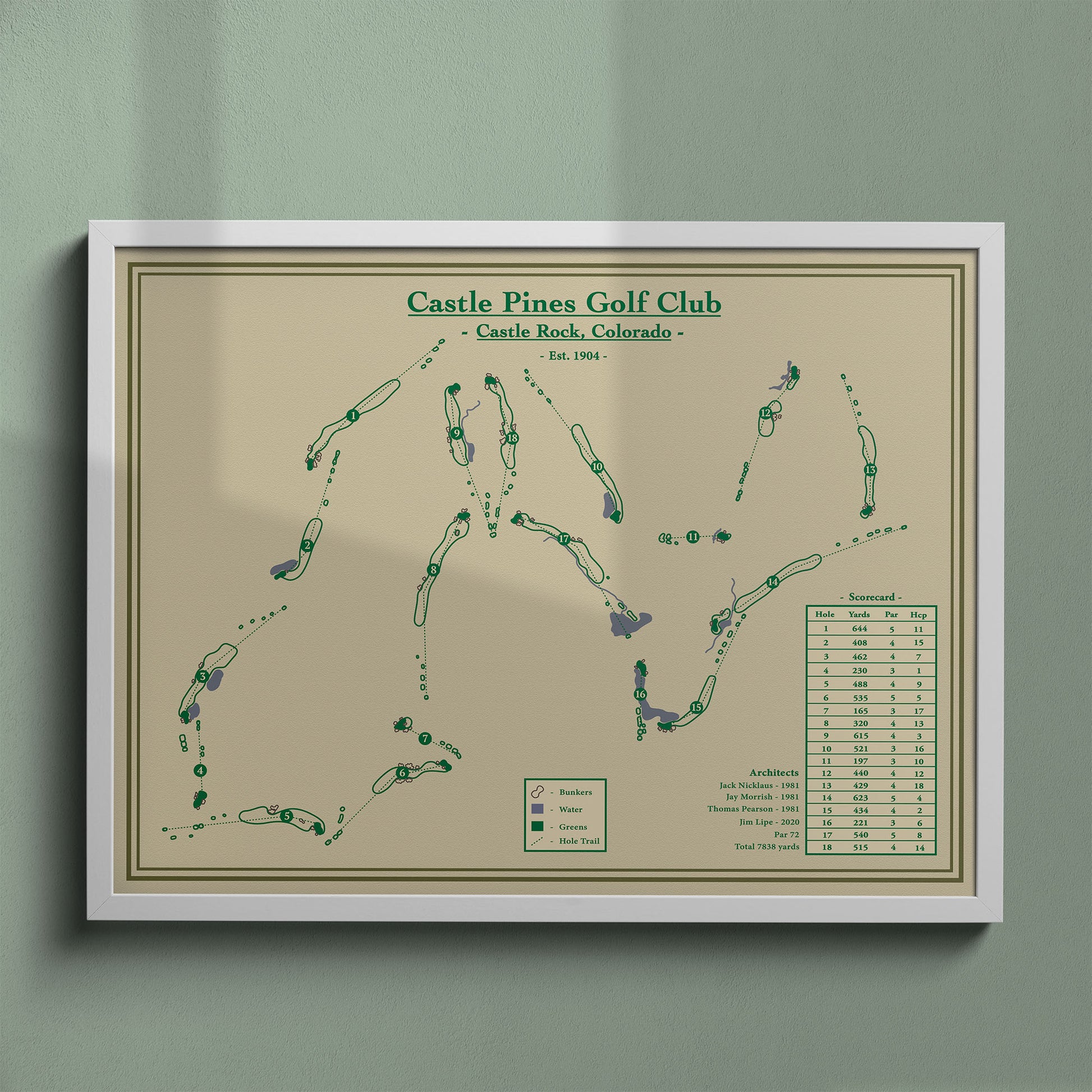 Castle Pines map print in a white frame, featuring the Jack Nicklaus signature course in Castle Rock, Colorado