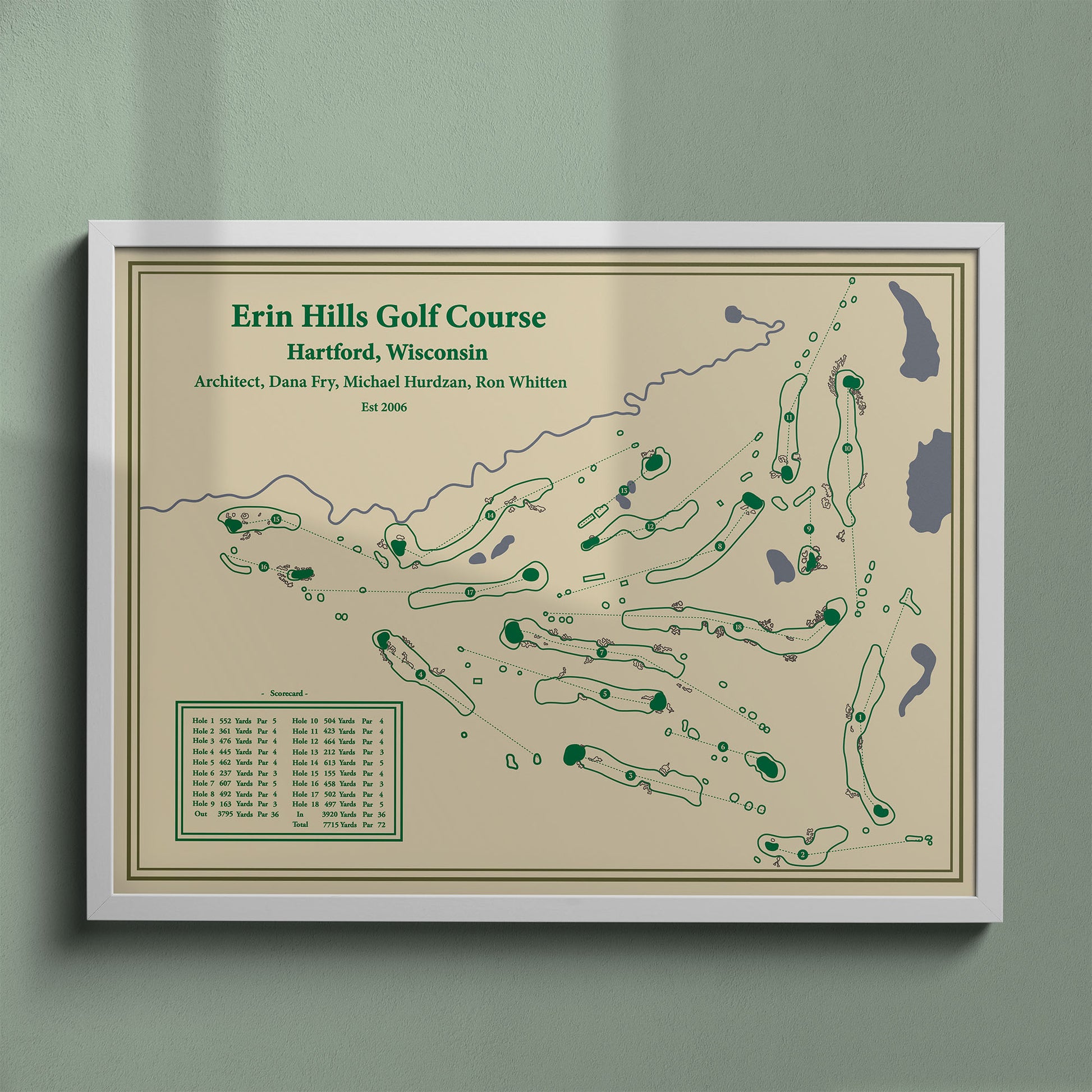 Erin Hills golf course map print in a white frame, featuring the fescue-lined fairways of the Kettle Moraine.