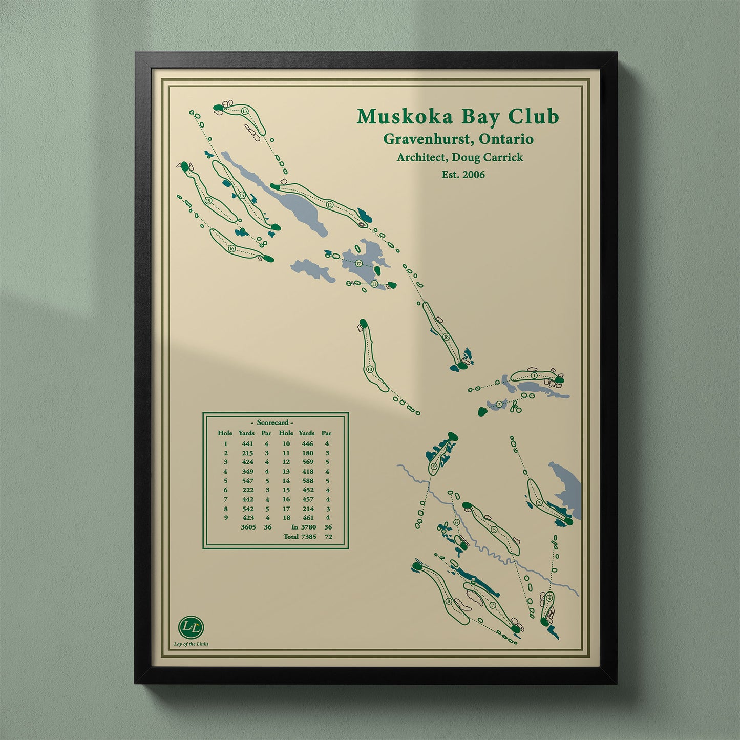 Framed Muskoka Bay Club map in a black wood frame showing the dramatic Doug Carrick design.