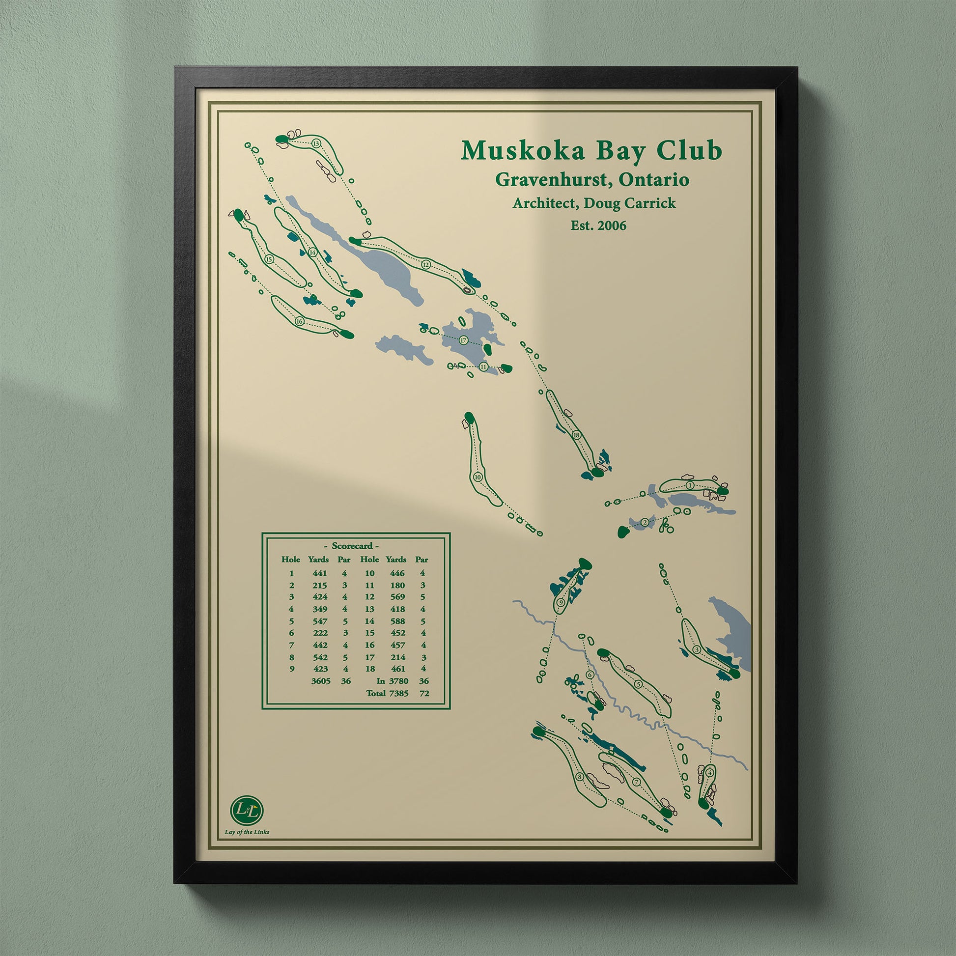 Framed Muskoka Bay Club map in a black wood frame showing the dramatic Doug Carrick design.