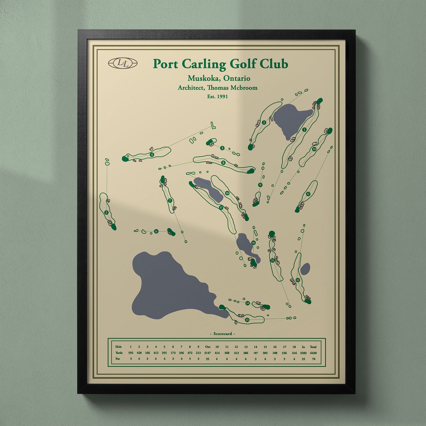 Framed Port Carling Golf & Country Club map in a black wood frame showing the Thomas McBroom masterpiece design.